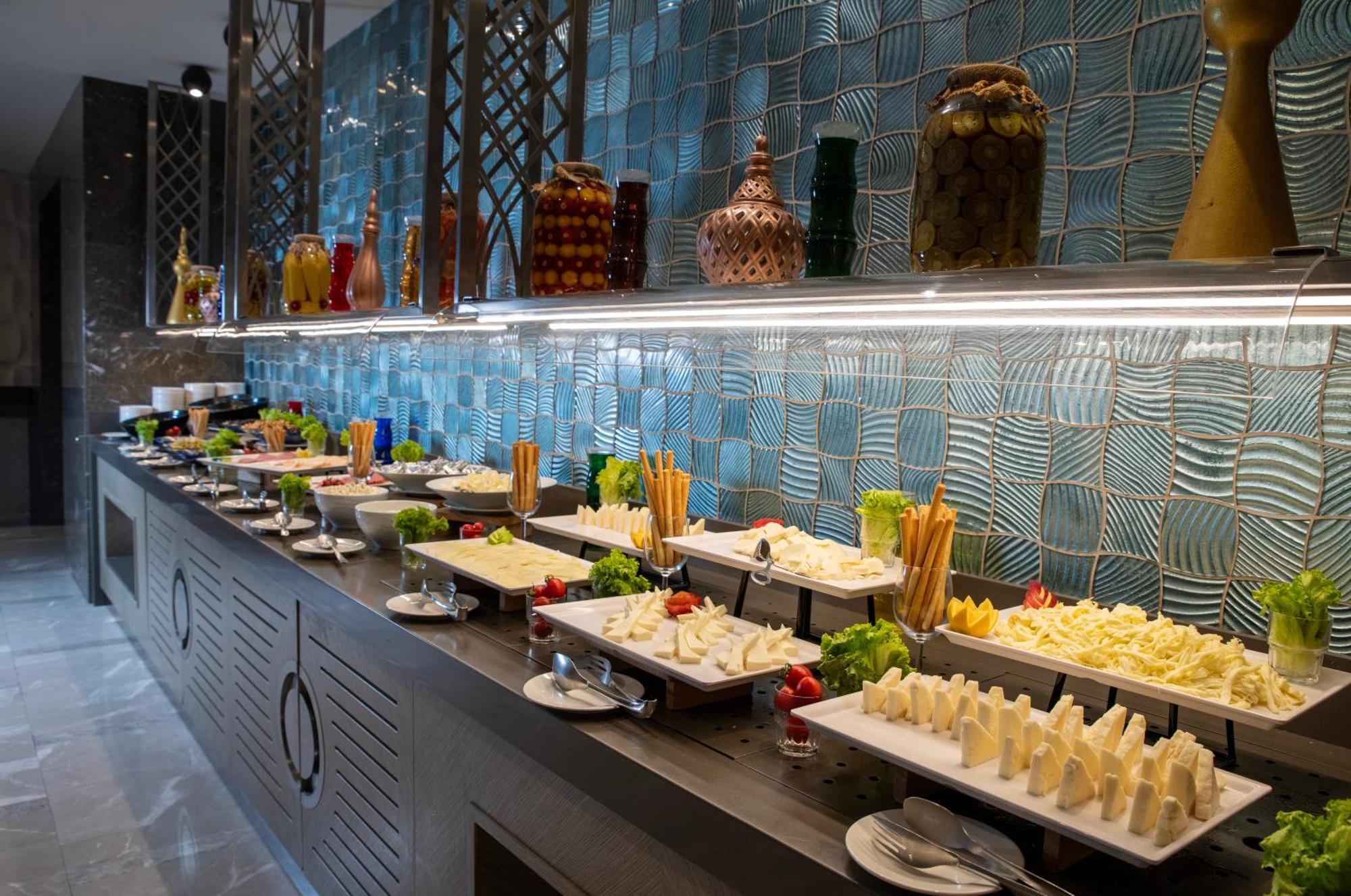 Windsor Hotel & Convention Center Istanbul Ngoại thất bức ảnh A cheese counter at a buffet